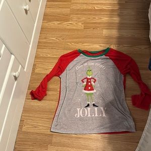 The grinch shirt size Small.